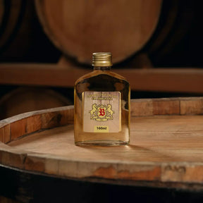 Cachaça Envelhecida em Amburana Série Ouro 160ml